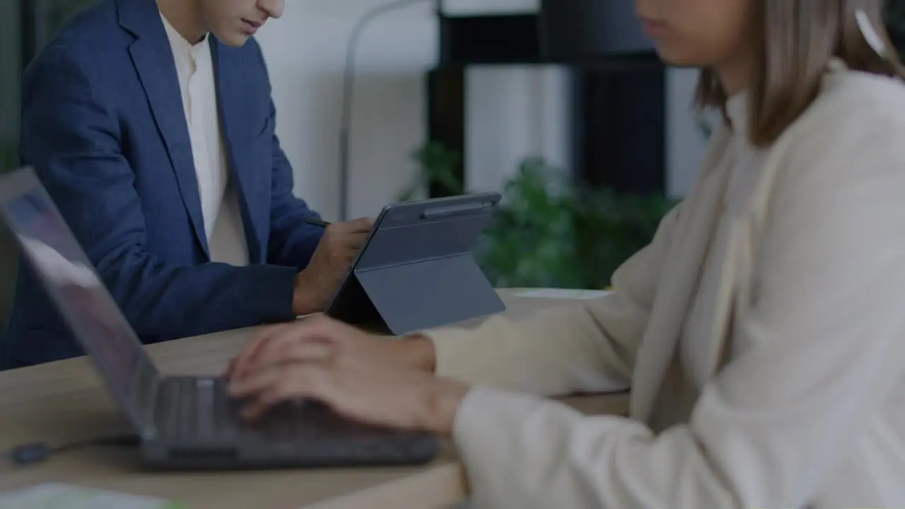 An office team on laptops